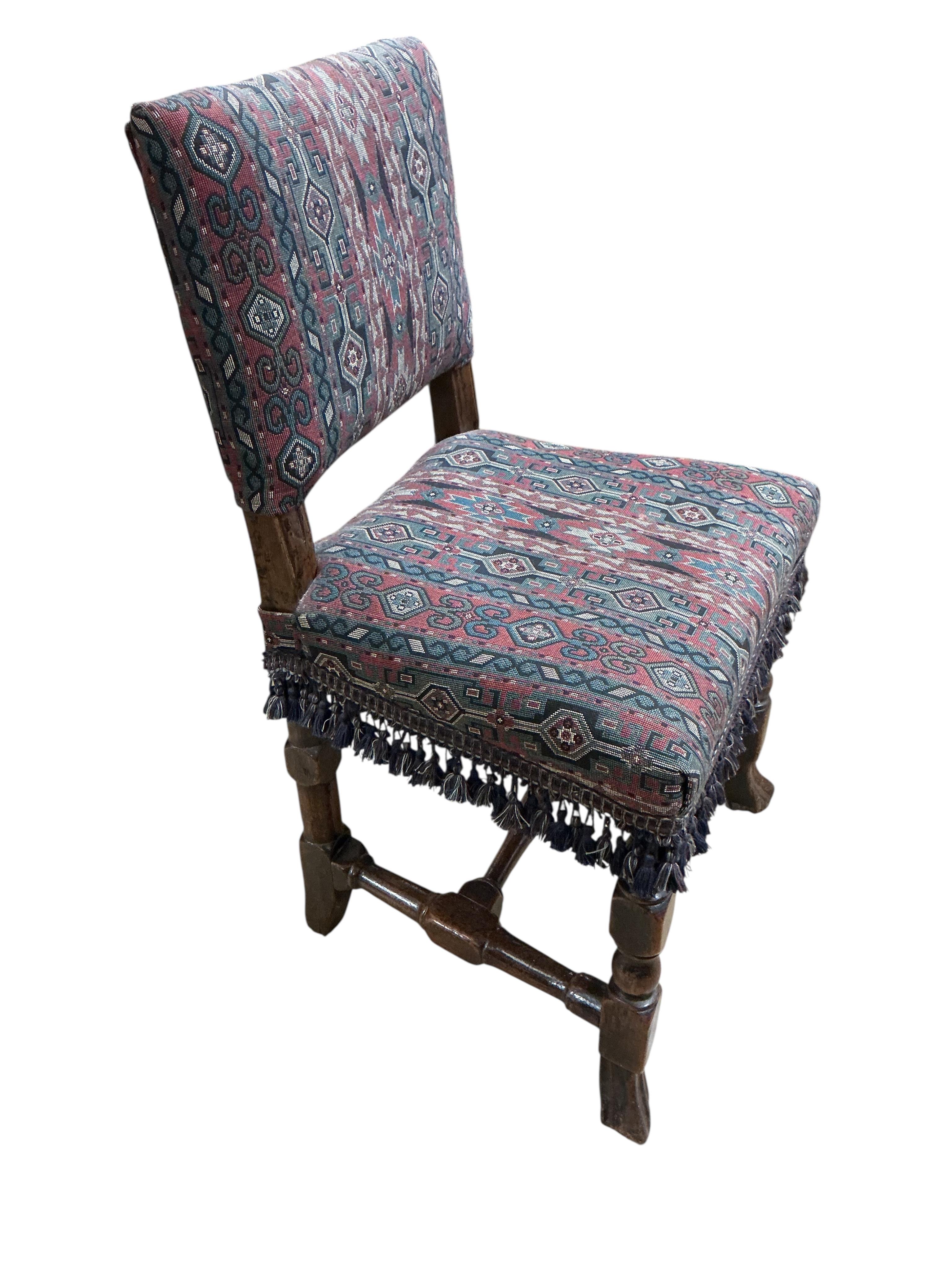 A late 17th century oak side chair, with Soumak carpet upholstery, width 49cm, depth 40cm, height 84cm